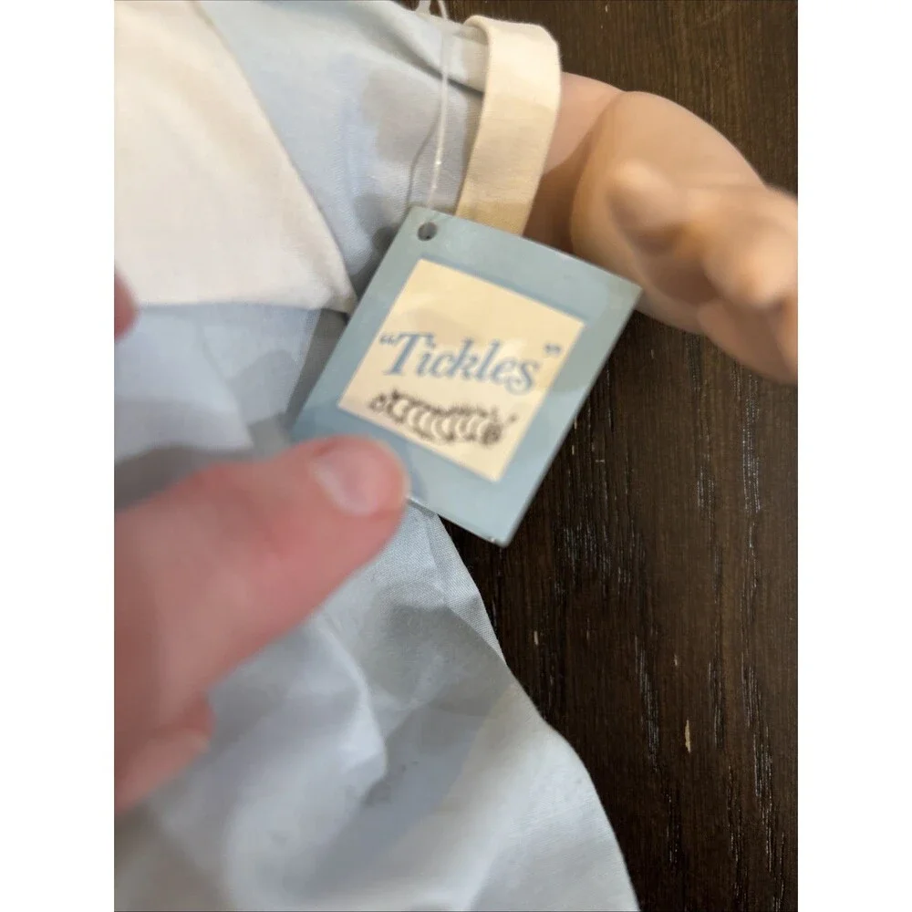 Ashton Drake tickles porcelain